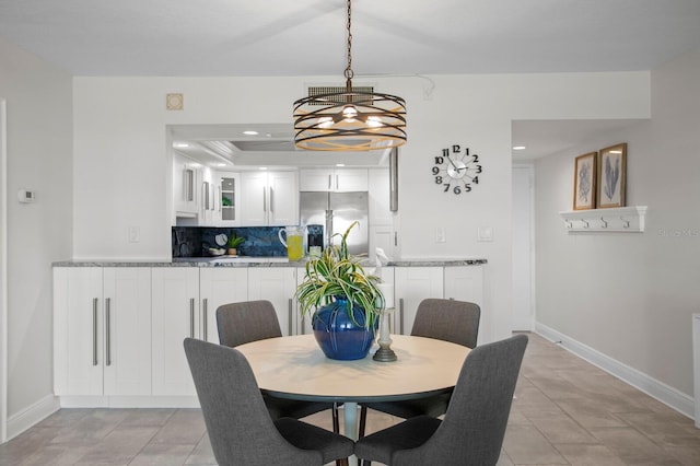 17920 Gulf Blvd Unit 1806, Redington Shores, FL 33708 - dining room featuring baseboards and recessed lighting