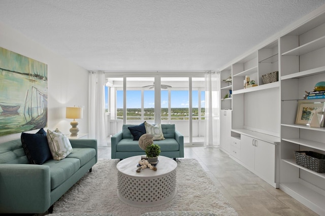 17920 Gulf Blvd Unit 1806, Redington Shores, FL 33708 - living area featuring a textured ceiling
