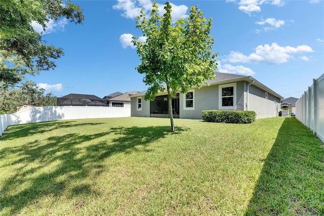 12957 Satin Lily Dr, Riverview, FL 33579 - back of house with stucco siding