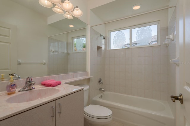 987 Chickadee Dr, Venice, FL 34285 - bathroom with vanity, toilet, and shower / bathtub combination