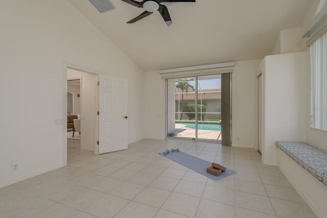 987 Chickadee Dr, Venice, FL 34285 - unfurnished room featuring a ceiling fan, light tile patterned floors, and high vaulted ceiling