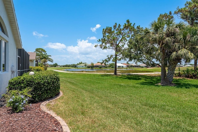 987 Chickadee Dr, Venice, FL 34285 - view of green lawn featuring a water view
