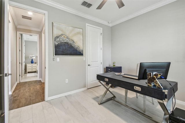751 Cajeput Loop, Tarpon Springs, FL 34689 - office area featuring light wood-type flooring, ceiling fan, crown molding, and baseboards