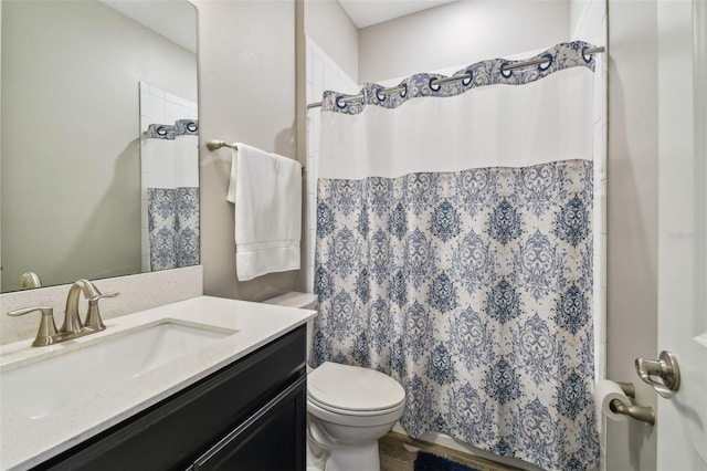 751 Cajeput Loop, Tarpon Springs, FL 34689 - bathroom featuring vanity, toilet, and curtained shower