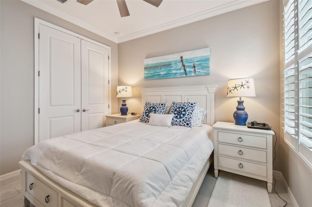 751 Cajeput Loop, Tarpon Springs, FL 34689 - bedroom featuring baseboards, crown molding, a closet, multiple windows, and a ceiling fan
