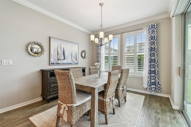 751 Cajeput Loop, Tarpon Springs, FL 34689 - dining room with a chandelier, crown molding, baseboards, and wood finished floors