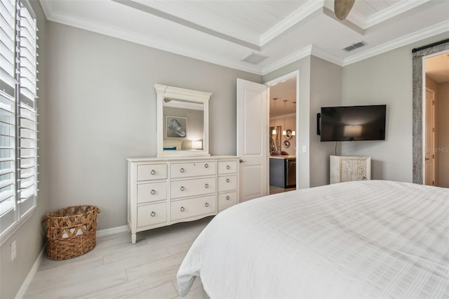 751 Cajeput Loop, Tarpon Springs, FL 34689 - bedroom featuring light wood finished floors, crown molding, baseboards, and ensuite bath