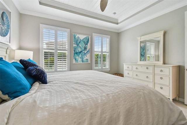 751 Cajeput Loop, Tarpon Springs, FL 34689 - bedroom with a raised ceiling, multiple windows, ornamental molding, and a ceiling fan