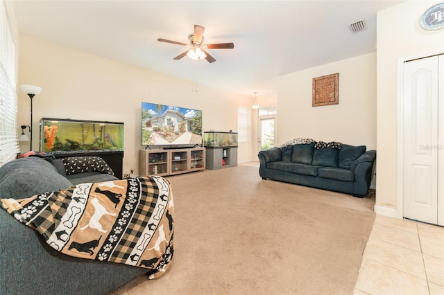 13803 Chalk Hill Pl, Riverview, FL 33579 - tiled living room with ceiling fan and carpet floors