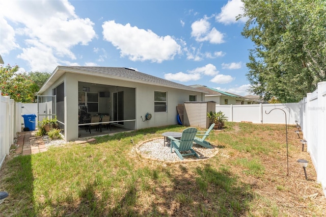 13803 Chalk Hill Pl, Riverview, FL 33579 - rear view of property featuring a sunroom and stucco siding