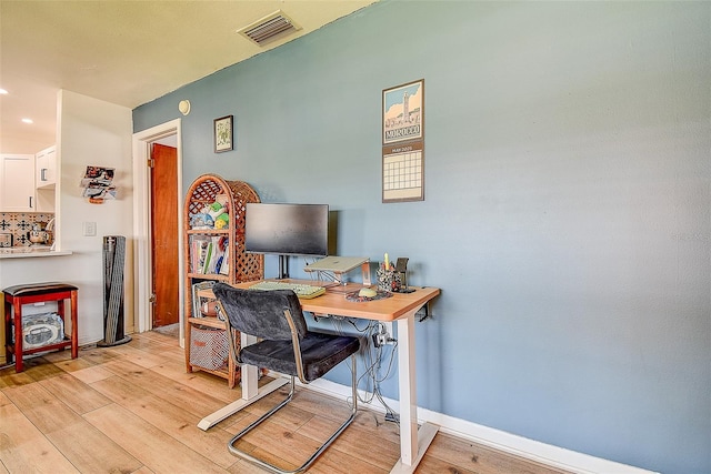 4050 4th St N Unit 205, Saint Petersburg, FL 33703 - home office with light wood-type flooring, baseboards, and recessed lighting
