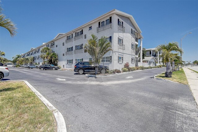 4050 4th St N Unit 205, Saint Petersburg, FL 33703 - view of building exterior featuring uncovered parking