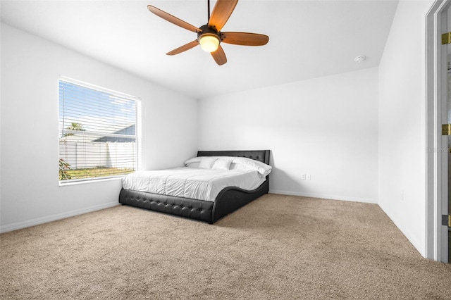 12136 Luftburrow Ln, Hudson, FL 34669 - carpeted bedroom featuring baseboards and ceiling fan