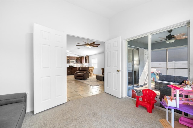 12136 Luftburrow Ln, Hudson, FL 34669 - rec room featuring ceiling fan, carpet, and tile patterned flooring