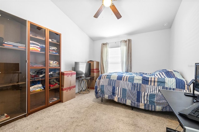 12136 Luftburrow Ln, Hudson, FL 34669 - carpeted bedroom featuring vaulted ceiling and a ceiling fan