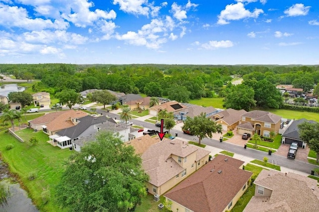 5525 Turtle Crossing Loop, Tampa, FL 33625 - aerial perspective of suburban area featuring a forest