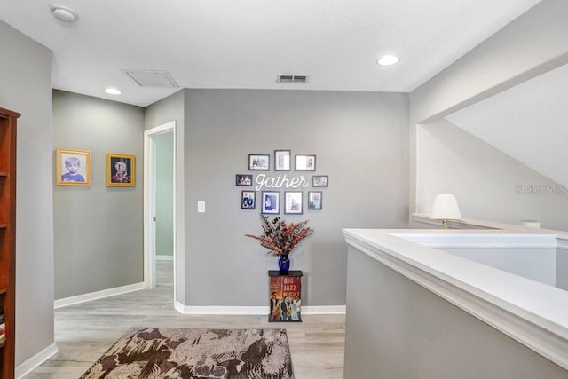 5525 Turtle Crossing Loop, Tampa, FL 33625 - corridor featuring light wood finished floors, baseboards, and recessed lighting