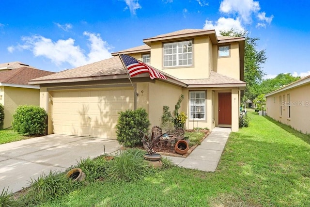 5525 Turtle Crossing Loop, Tampa, FL 33625 - traditional-style house featuring an attached garage, a front yard, stucco siding, and driveway