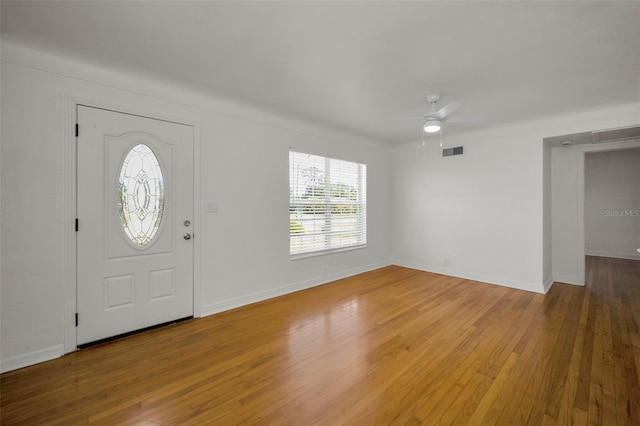 5642 9th Ave N, Saint Petersburg, FL 33710 - entryway featuring ceiling fan, wood finished floors, and baseboards