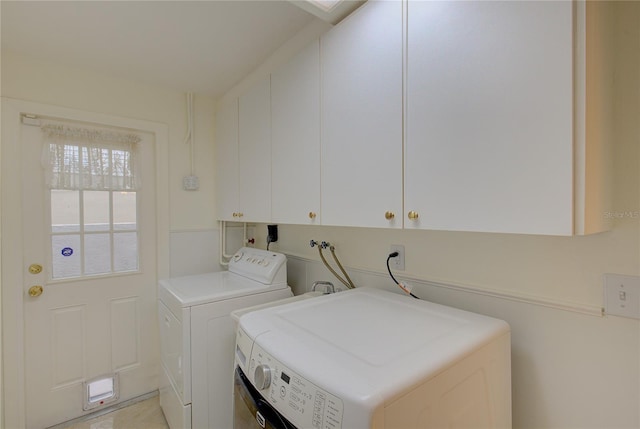 31 Freshwater Dr, Palm Harbor, FL 34684 - washroom featuring cabinet space and washer and dryer