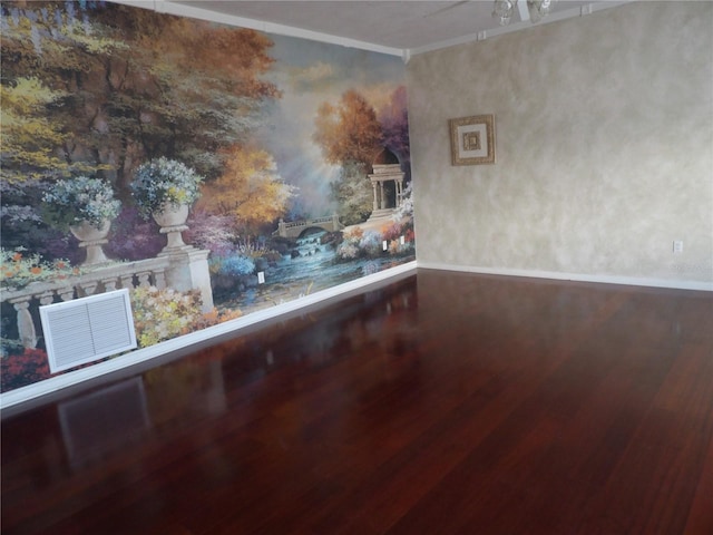31 Freshwater Dr, Palm Harbor, FL 34684 - spare room with wood finished floors, crown molding, and baseboards