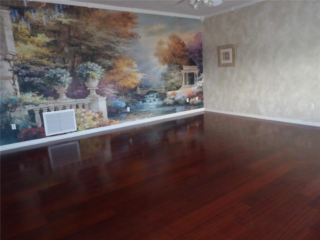31 Freshwater Dr, Palm Harbor, FL 34684 - unfurnished room with wood finished floors, baseboards, and ornamental molding
