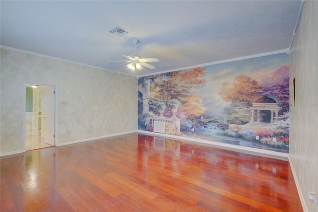 31 Freshwater Dr, Palm Harbor, FL 34684 - spare room with ceiling fan, wood finished floors, baseboards, and ornamental molding