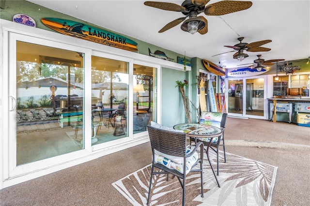 9611 107th Ave N, Largo, FL 33773 - sunroom / solarium featuring a ceiling fan and carpet flooring