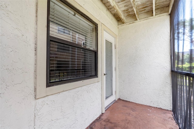 11901 4th St N Unit 5111, Saint Petersburg, FL 33716 - doorway to property with stucco siding