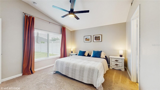 19635 Bellehurst Loop, Land O Lakes, FL 34638 - bedroom with light carpet, lofted ceiling, baseboards, and a ceiling fan