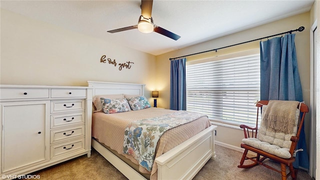 19635 Bellehurst Loop, Land O Lakes, FL 34638 - bedroom with light colored carpet, baseboards, and a ceiling fan