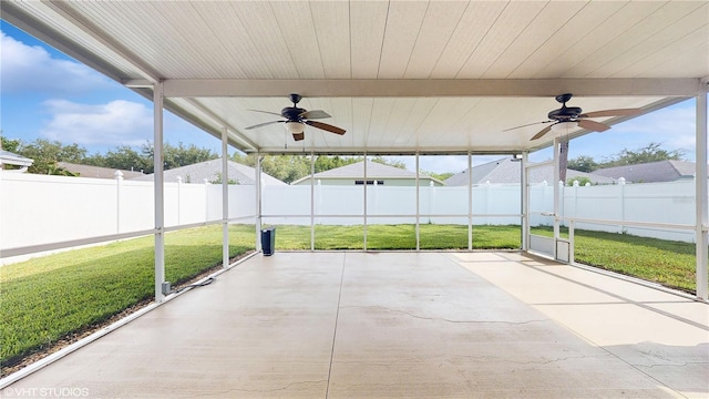 19635 Bellehurst Loop, Land O Lakes, FL 34638 - unfurnished sunroom with ceiling fan, beamed ceiling, and healthy amount of natural light