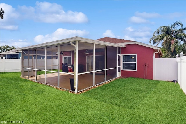 19635 Bellehurst Loop, Land O Lakes, FL 34638 - back of house featuring a sunroom, stucco siding, and ceiling fan