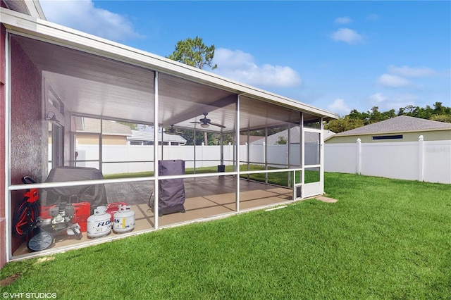 19635 Bellehurst Loop, Land O Lakes, FL 34638 - view of yard with a sunroom, a patio, and a ceiling fan