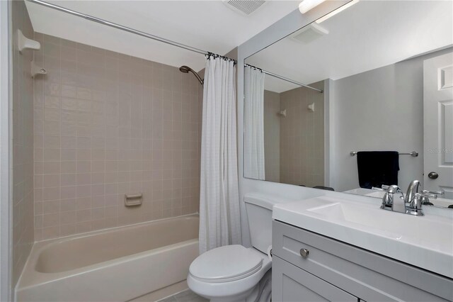6817 Stones Throw Cir N Unit 17203, Saint Petersburg, FL 33710 - bathroom with vanity, shower / tub combo, and toilet