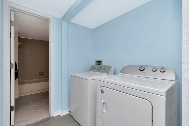 6817 Stones Throw Cir N Unit 17203, Saint Petersburg, FL 33710 - washroom featuring washer and clothes dryer
