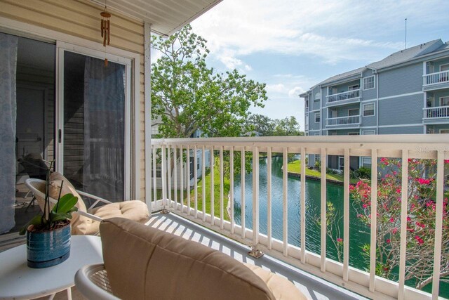 6817 Stones Throw Cir N Unit 17203, Saint Petersburg, FL 33710 - balcony featuring a water view