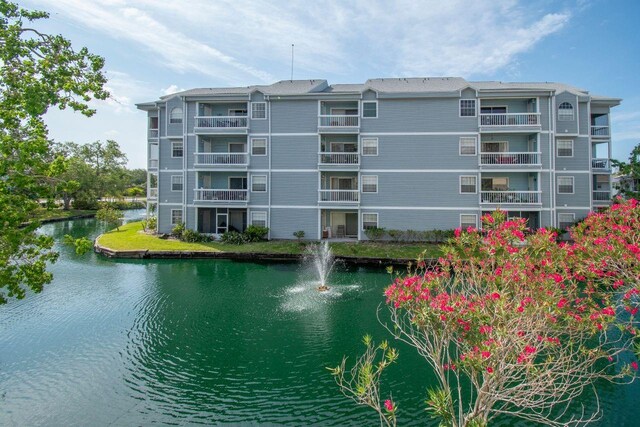 6817 Stones Throw Cir N Unit 17203, Saint Petersburg, FL 33710 - view of apartment building / complex with a water view
