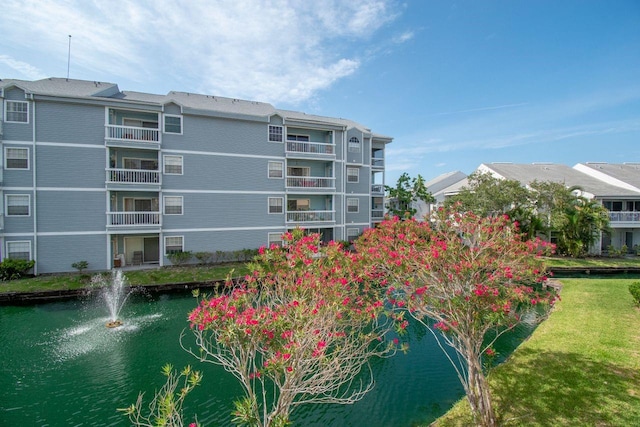 6817 Stones Throw Cir N Unit 17203, Saint Petersburg, FL 33710 - view of apartment building / complex with a water view