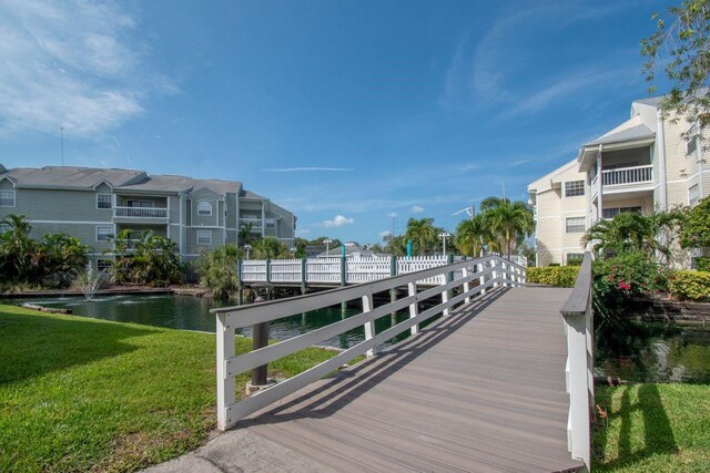 6817 Stones Throw Cir N Unit 17203, Saint Petersburg, FL 33710 - surrounding community with a yard, a residential view, and a water view