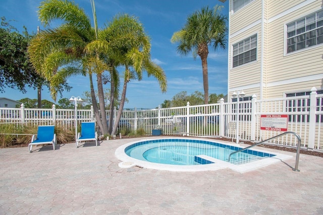 6817 Stones Throw Cir N Unit 17203, Saint Petersburg, FL 33710 - view of swimming pool featuring a pool and a patio area