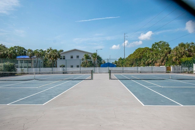 6817 Stones Throw Cir N Unit 17203, Saint Petersburg, FL 33710 - view of tennis court featuring community basketball court