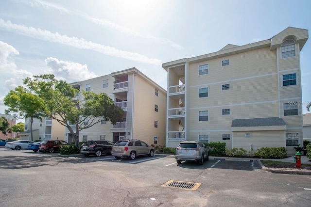 6817 Stones Throw Cir N Unit 17203, Saint Petersburg, FL 33710 - view of apartment building / complex featuring uncovered parking