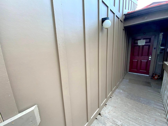 5310 Pebble Beach Dr Unit F, Orlando, FL 32811 - property entrance with board and batten siding