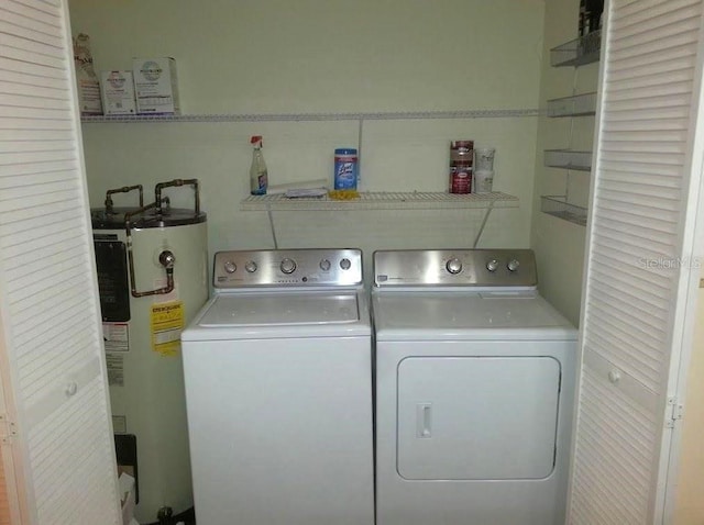 5310 Pebble Beach Dr Unit F, Orlando, FL 32811 - laundry area featuring independent washer and dryer and water heater