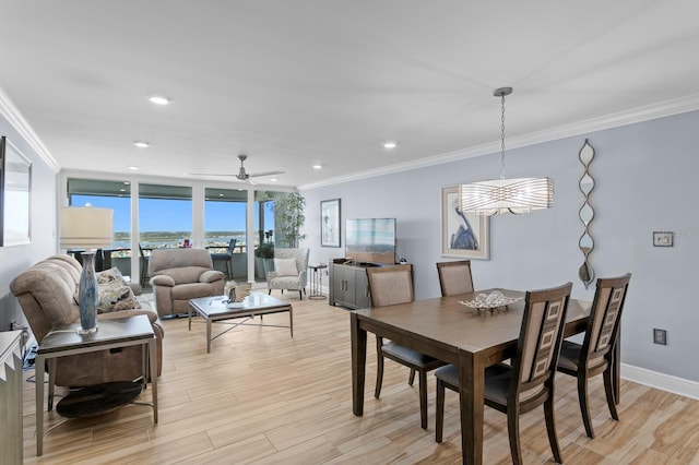 17920 Gulf Blvd Unit 1901, Redington Shores, FL 33708 - dining space featuring crown molding, light wood-style floors, ceiling fan, recessed lighting, and baseboards
