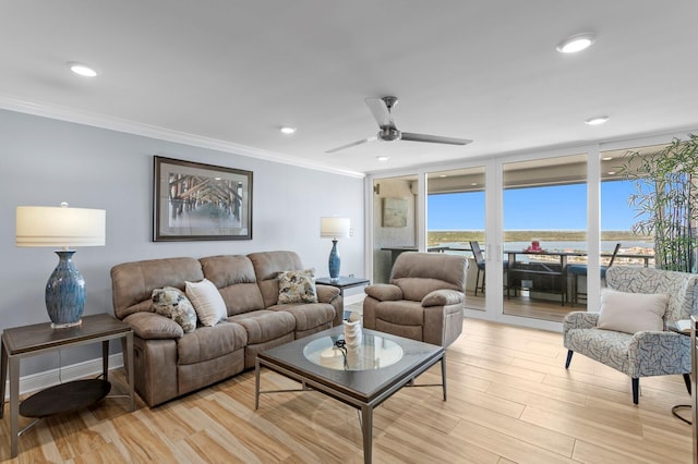 17920 Gulf Blvd Unit 1901, Redington Shores, FL 33708 - living area with expansive windows, light wood-style floors, ornamental molding, a ceiling fan, and recessed lighting