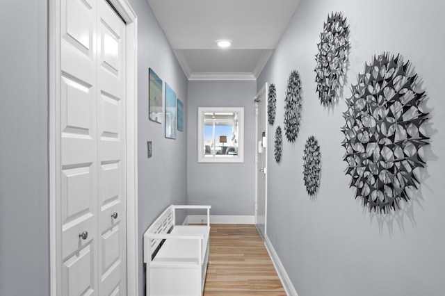 17920 Gulf Blvd Unit 1901, Redington Shores, FL 33708 - corridor featuring ornamental molding, light wood-style floors, and baseboards