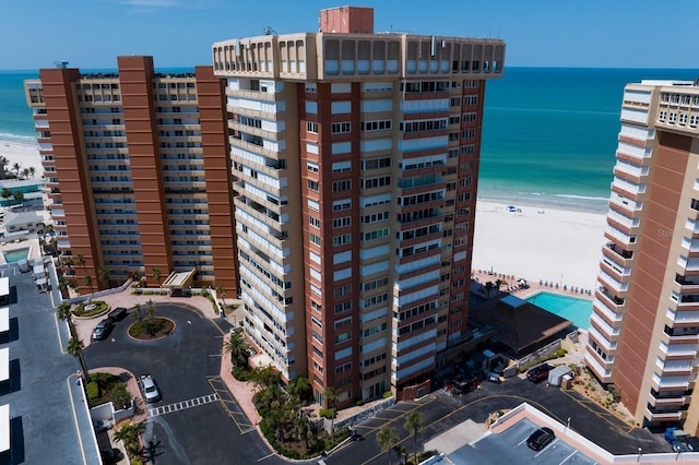 17920 Gulf Blvd Unit 1901, Redington Shores, FL 33708 - view of apartment building / complex featuring view of water and beach and uncovered parking
