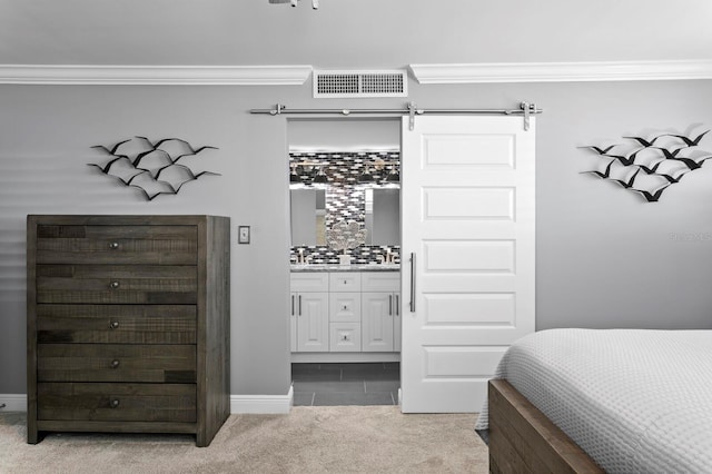 17920 Gulf Blvd Unit 1901, Redington Shores, FL 33708 - bedroom featuring ornamental molding, carpet flooring, connected bathroom, and baseboards